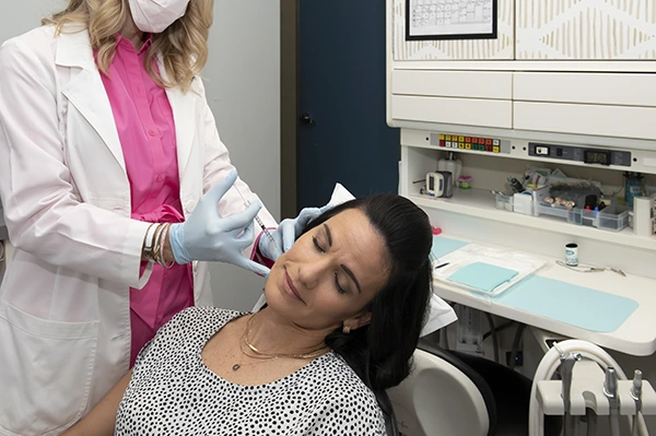 Patient receiving a facial injectable treatment at KG Dentistry