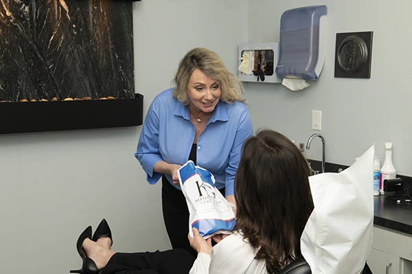 Dental hygienist providing a professional teeth cleaning at KG Dentistry