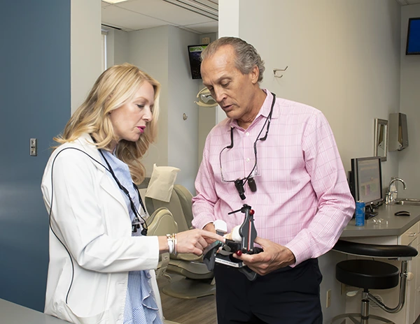 KG Dentistry team planning a dental implant restoration