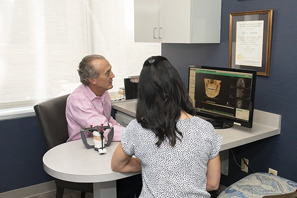 Dr. Kyle Keeter planning a custom denture treatment