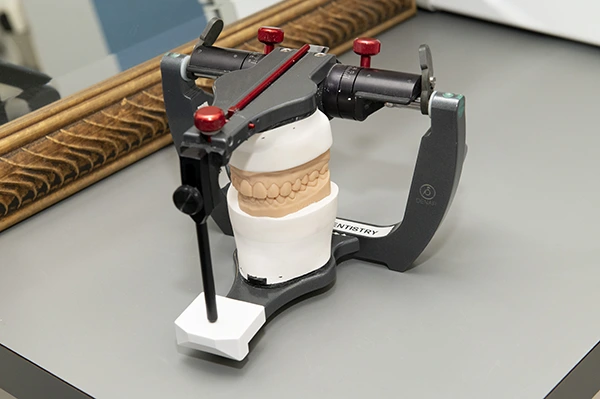 Dental articulator used to plan TMJ treatment